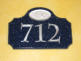 These were Cobalt Corian.  The numbers were 3-D Engraved and painted Metallic Silver.  The Inlays were 1/4" Clear Acrylic with a 3-D Engraved "R".  The Inlays were Back-Painted (2nd Surface Painted) the same Metallic Silver. 